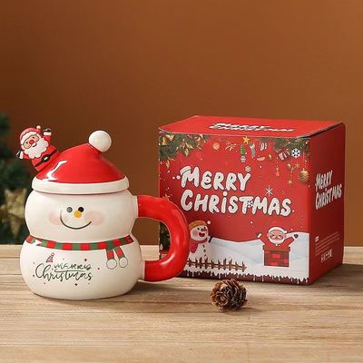 Experience the Magic of Christmas with our 400ml Ceramic Santa Mug and Spoon Set