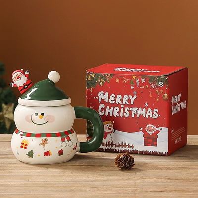 Experience the Magic of Christmas with our 400ml Ceramic Santa Mug and Spoon Set