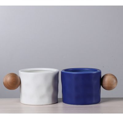 330ml Blue And White Ceramic Coffee Mug With Wooden Spherical Handle For Business Gifting