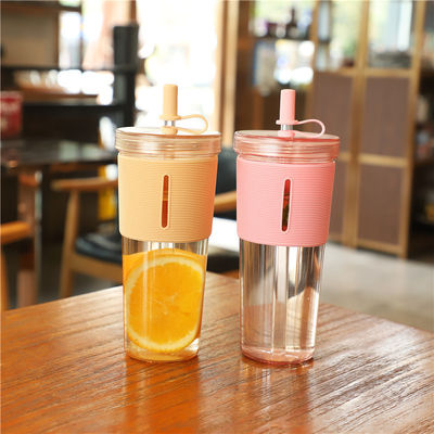Double Wall Plastic Reusable Bubble Tea Cup with 700ml Capacity and Silicone Sleeve