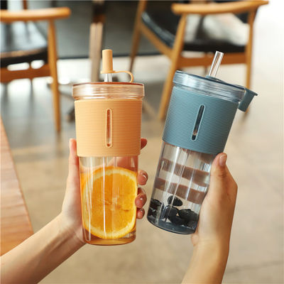 Double Wall Plastic Reusable Bubble Tea Cup with 700ml Capacity and Silicone Sleeve
