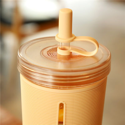 Double Wall Plastic Reusable Bubble Tea Cup with 700ml Capacity and Silicone Sleeve