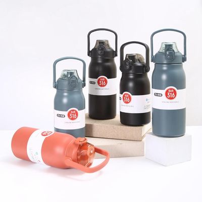 Outdoor Water Bottle with Portable Handle and Bounce Cover Accepts Customized Colors